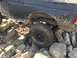 1989 Ford Bronco - This 1989 Ford Bronco is shown off-roading over a pile of rocks.