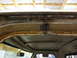 1967 Ford F-250 - Close-up view of significant rust damage along the roof seam of an older vehicle.