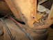 1967 Ford F-250 - Rusted frame section with visible wiring, suggesting structural damage or repair needs.