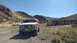 1981 Ford Bronco - This 1980s Ford Bronco is parked in a rural, arid landscape under a clear blue sky.