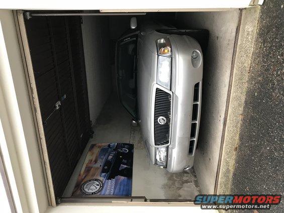 Silver 2003 Mercury Marauder parked in a garage