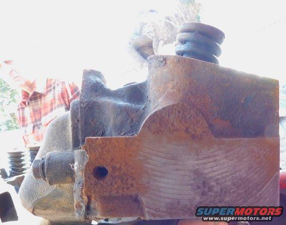 Rusty brake master cylinder with coiled spring