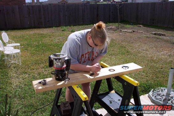 dcp_4238.jpg My wife wanted to make me something very unique, so she went through my parts boxes and picked out some parts to inlay into a card table.  From a few 2x6s, some plywood, some polyurethane, and some junk parts, she made a really cool table.