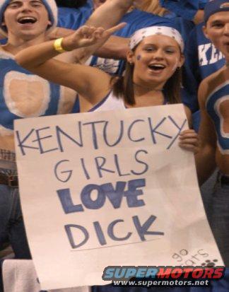 Fans holding a sign that says "KENTUCKY GIRLS LOVE DICK"