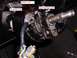 1990 Ford Bronco - Steering column ignition switch mechanism showing a broken part and labeled components.