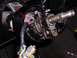1990 Ford Bronco - The internal components of a vehicle's steering column are shown, with wiring harnesses and mechanical parts exposed.