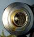 2000 Ford Crown Victoria - This is a close-up view of an oil filter, showing its internal structure and some oil staining.