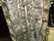 1969 Ford Mustang - Close-up view of an engine block, revealing its internal structure and signs of wear.