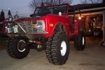 1974 Ford Bronco with aftermarket front bumper and large off-road tires