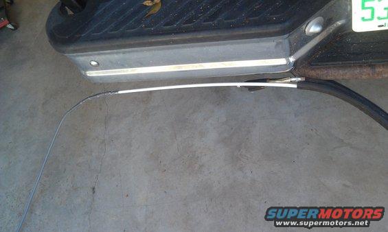 Rear bumper and detached cable