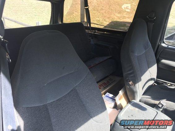 Interior view of a 1992 Ford Bronco showing front and rear seats
