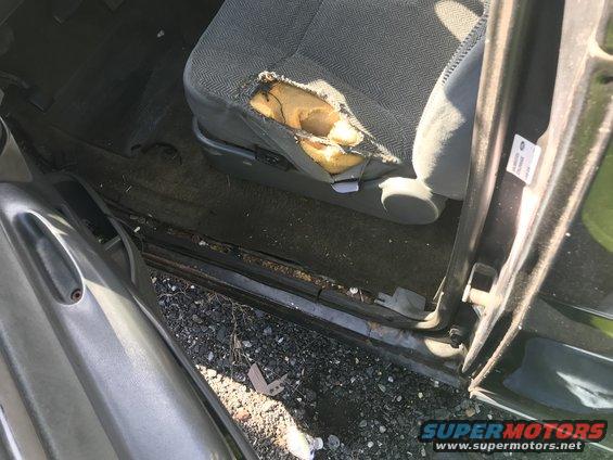 Torn driver's seat interior of a vehicle