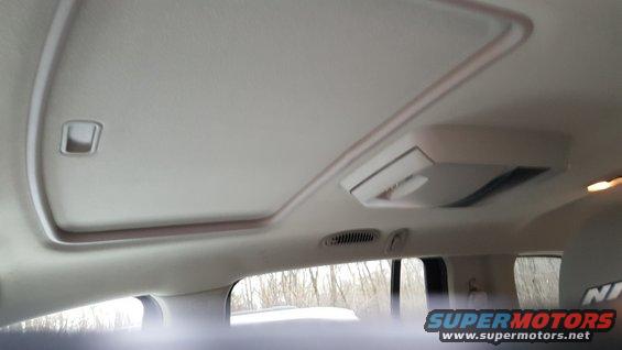 Interior view of a sunroof and overhead console in a vehicle