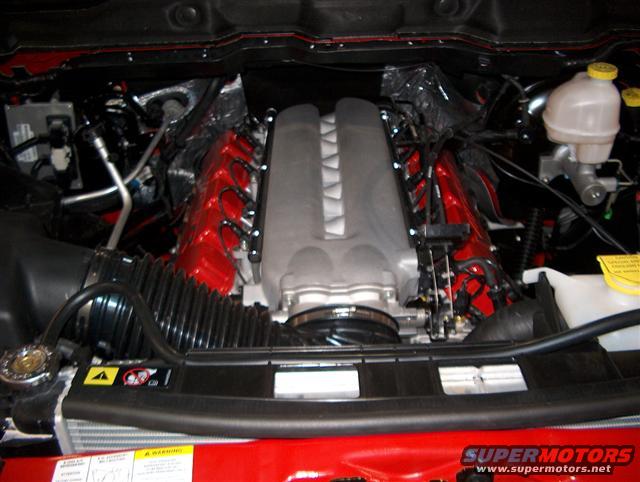 Dodge Viper V10 engine bay with red valve covers and silver intake manifold