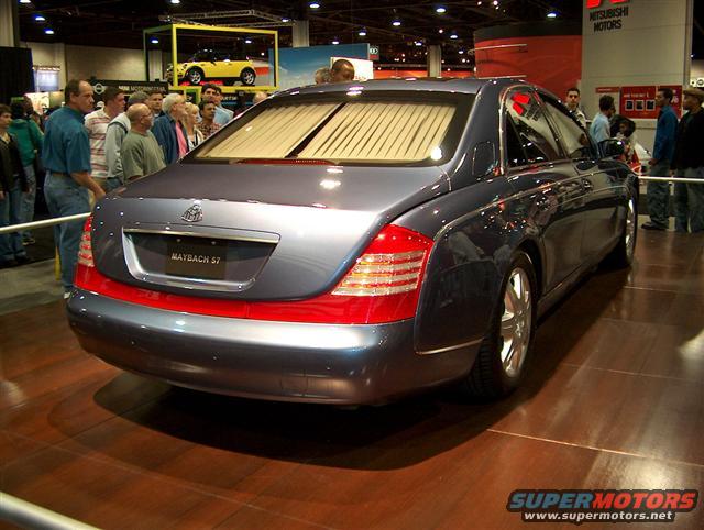 Dark blue Maybach 57 rear view with red accent band