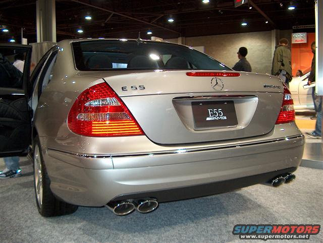 Silver Mercedes-Benz E55 AMG rear view with quad exhaust pipes