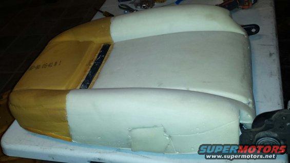 Car seat foam cushion with visible part number "BP-80 05-42 #1" stamped on the side