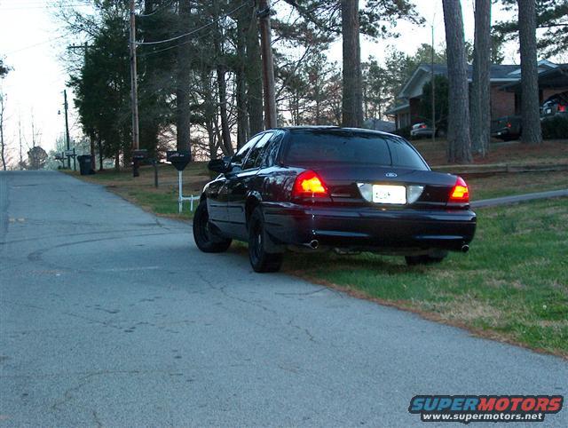 2001 Ford Crown Victoria parked on a street, rear view