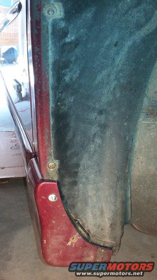 Red fender flare and dark wheel well liner