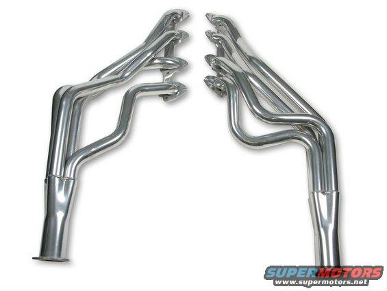 Pair of shiny chrome exhaust headers for a car engine