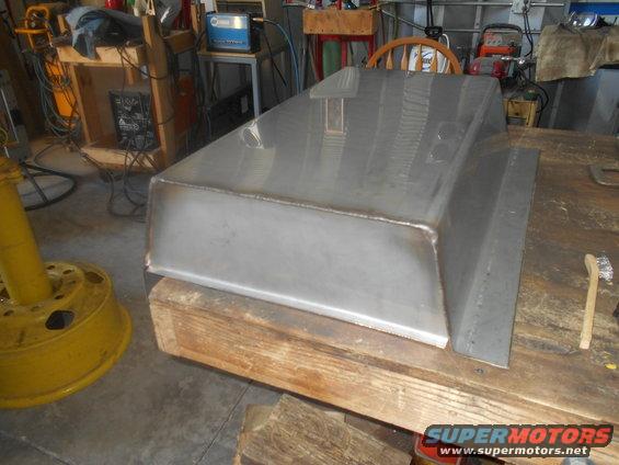 Unfinished metal part on wooden blocks