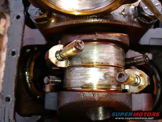 Engine crankshaft bearing with visible wear