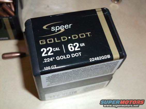 Black and gold Speer Gold Dot 22 Cal 62 Gr ammunition box with text and a bullet on the side