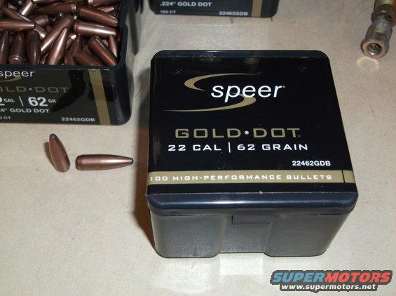 Box of Speer Gold Dot 22 Cal 62 Grain bullets with loose bullets and another box in background