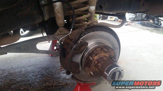 Front brake assembly with WARN hub