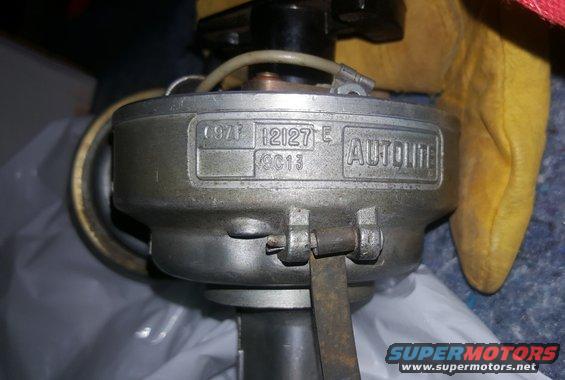 Close-up of an Autolite distributor with part numbers visible, including '0971' and '12127E'