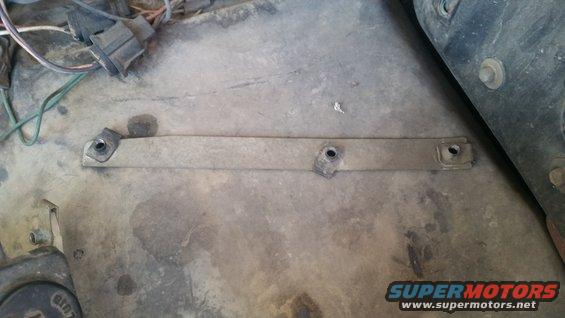 Underhood bracket with wires and bolts