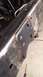 1979 Ford Bronco - A close-up view of a vehicle frame shows extensive welding and bolts, with visible rust.