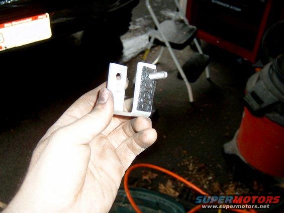 The filter had a screw on the end, I'm assuming for the actual kit.  I made a bracket out of aluminum to hold the filter to the inner fender.  I put a piece of foam on it so there wasn&rsquo;t any metal-metal contact.