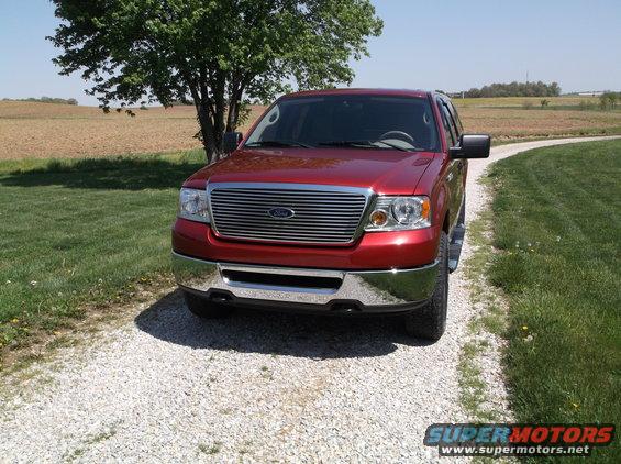Red 2008 Ford F-150 front grille and headlights