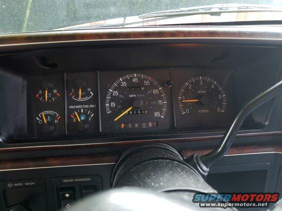 1989 Ford Bronco dashboard with speedometer, tachometer, fuel, and temperature gauges