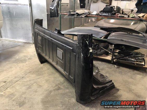 Black pickup truck bed with vents on the side