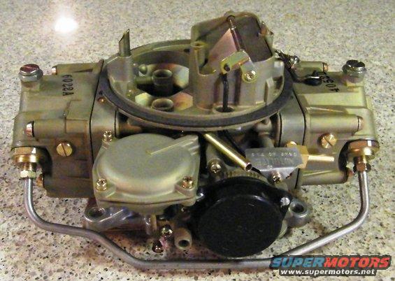 Holley carburetor with part numbers visible on the body