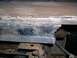 1986 Ford Bronco - Close-up of rusted metal frame showing welds and damage.