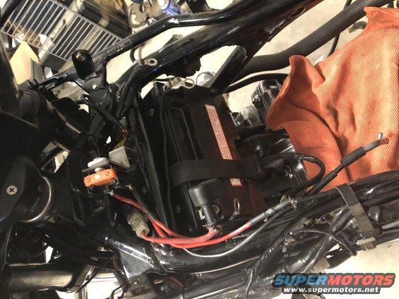 Motorcycle battery and wiring with orange fuse holder