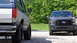 1987 Ford Bronco - A vintage SUV is parked alongside a contemporary pickup truck, with the focus on the rear of the older vehicle.