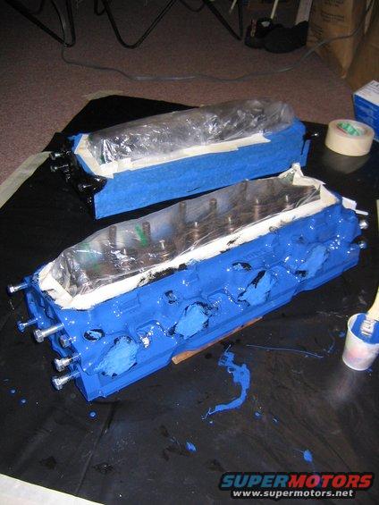 head_paint0002.jpg First coat of blue.  This paint is REALLY thick.  Usually I dont like to thin paints for spraying, but I would thin this paint.  It's hard to brush on even.  If you dont have enough, the black comes thru, and if you have too much, it pools up and lays on realll thick.  You have to get it just right.