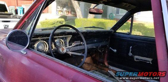 1966 Ford Ranchero interior showing dashboard, steering wheel, and door panel