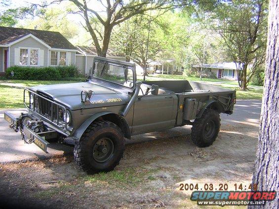 Olive drab military truck with winch and USMC 309131 markings