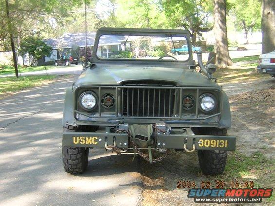 Green military jeep front view with USMC and 309131 markings