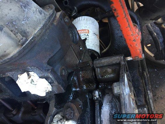 Engine oil filter with "Motorcraft" text and part number visible