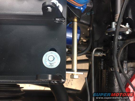 Steering linkage and mounting bracket with bolt and washer