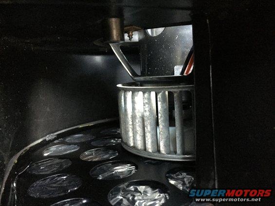 blower motor and housing inside a vehicle's HVAC system