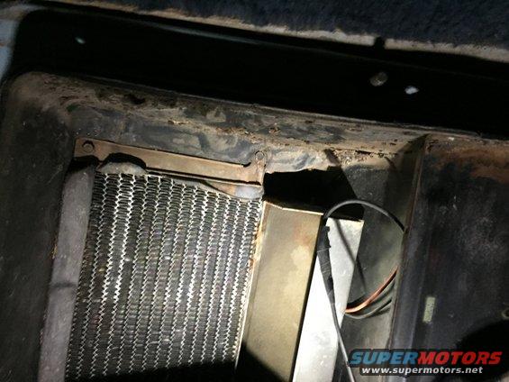 Heater core assembly with rusted metal frame and wiring