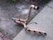 1990 Ford Bronco - This rusty exhaust manifold has four exhaust ports and two pipes that merge into one outlet.
