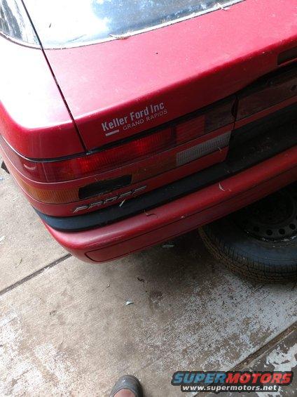 Red car rear with PROBE text and Keller Ford Inc. sticker